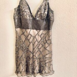Handmade beaded dress .